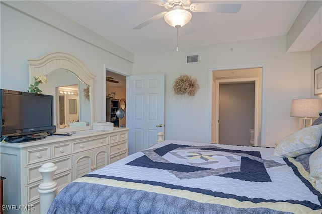 bedroom featuring ceiling fan and connected bathroom