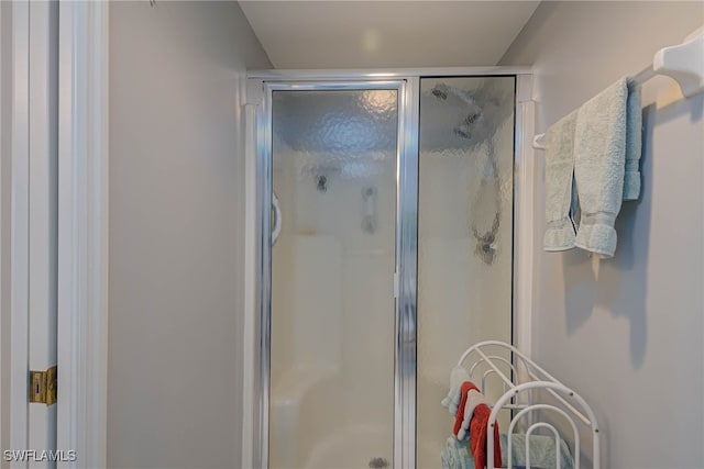 bathroom with an enclosed shower