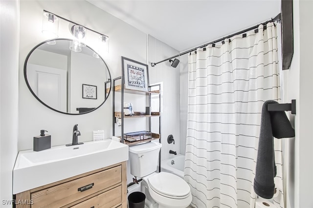 full bathroom with vanity, shower / bath combination with curtain, and toilet