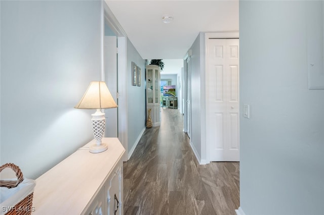 hallway featuring hardwood / wood-style flooring