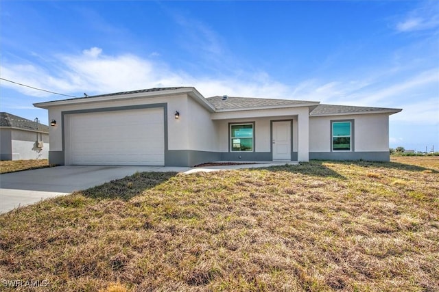 ranch-style house with a garage and a front yard