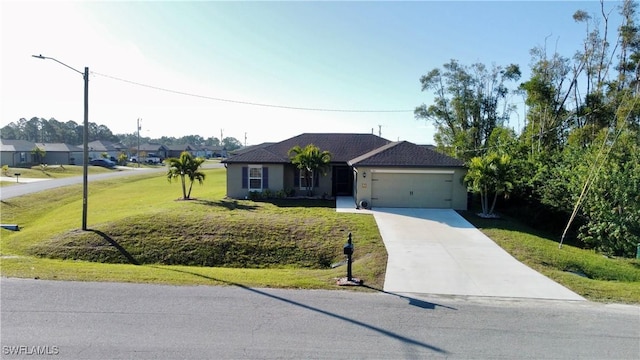 single story home with a garage and a front yard