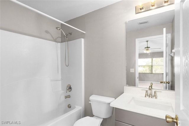 full bathroom featuring vanity, shower / bathtub combination, and toilet