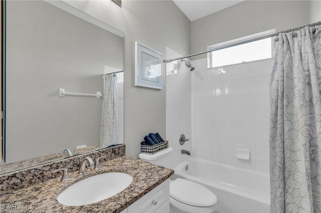 full bathroom featuring vanity, shower / bath combination with curtain, and toilet