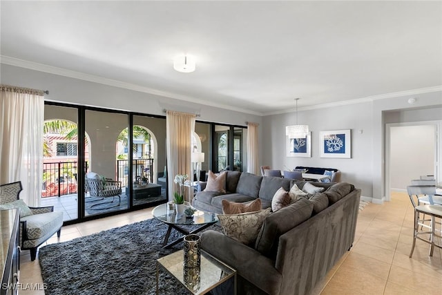 living room with crown molding, plenty of natural light, and light tile patterned floors