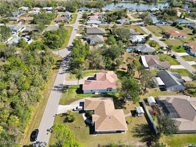 drone / aerial view featuring a water view