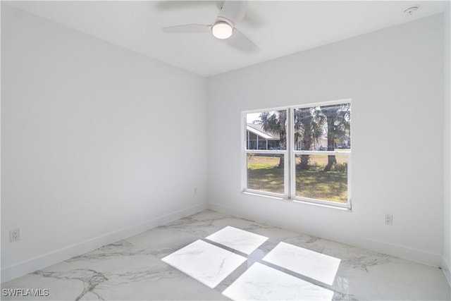 empty room featuring ceiling fan