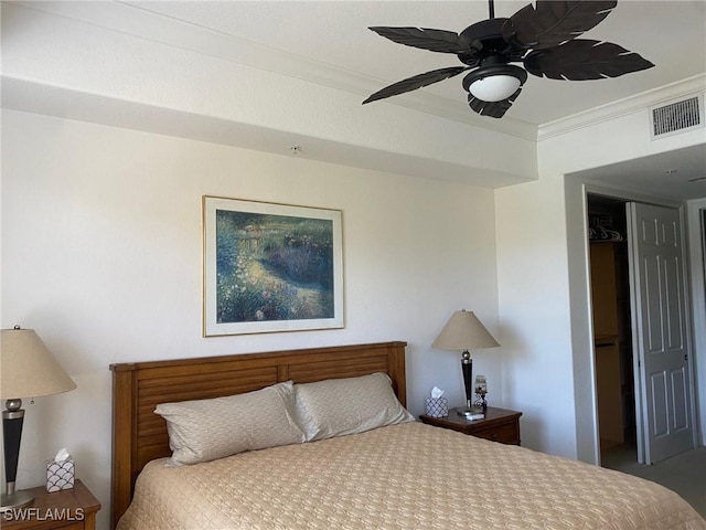 bedroom with visible vents, ceiling fan, and crown molding