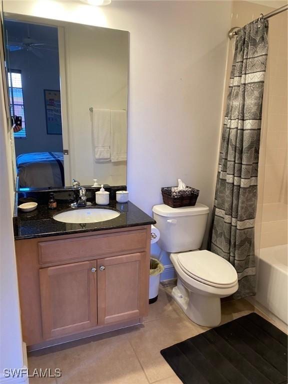 full bathroom with tile patterned flooring, vanity, shower / bath combination with curtain, and toilet