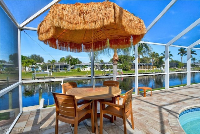 sunroom with a water view