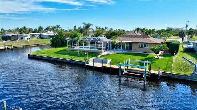 dock area with boat lift, a lanai, a water view, a yard, and a swimming pool