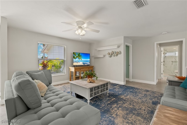 living room featuring ceiling fan