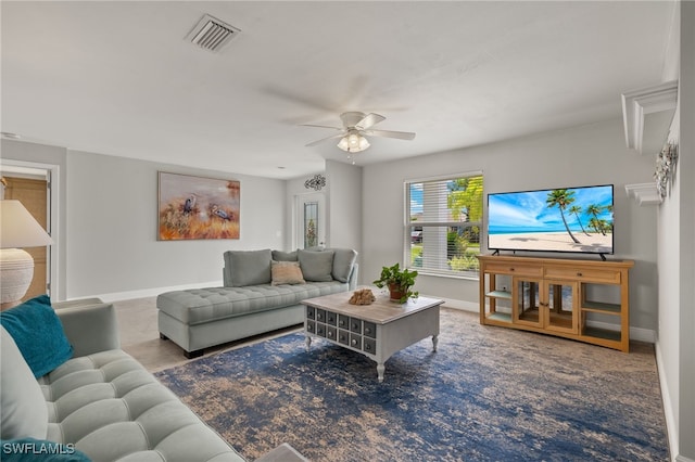 living room featuring ceiling fan