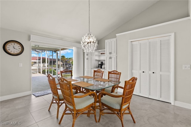 tiled dining area featuring lofted ceiling