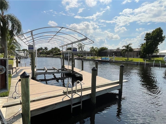 dock area featuring a water view