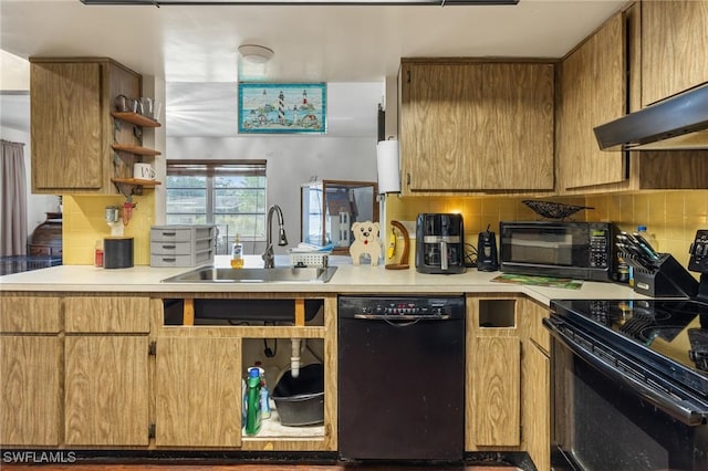 kitchen with range hood, sink, decorative backsplash, and black appliances