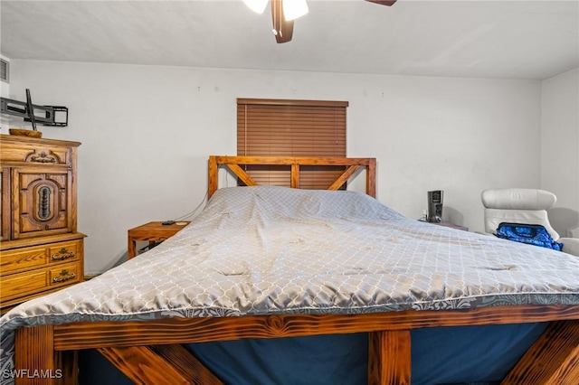 bedroom featuring ceiling fan