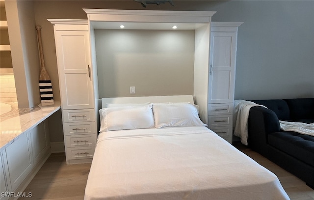 bedroom featuring hardwood / wood-style flooring