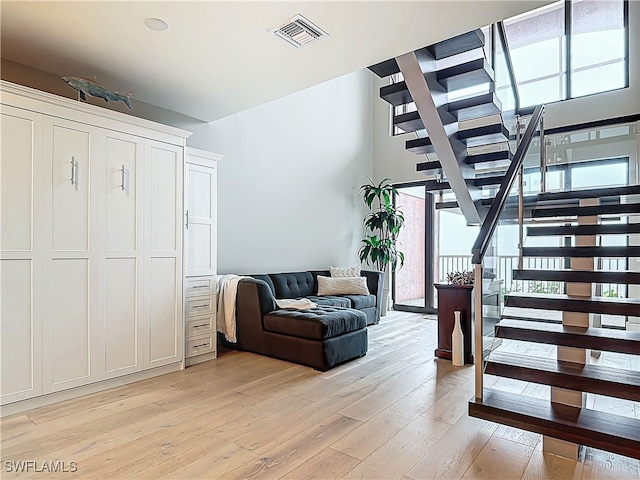 stairway with wood-type flooring