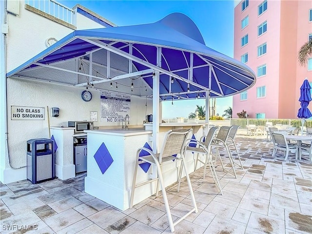 view of patio / terrace featuring sink