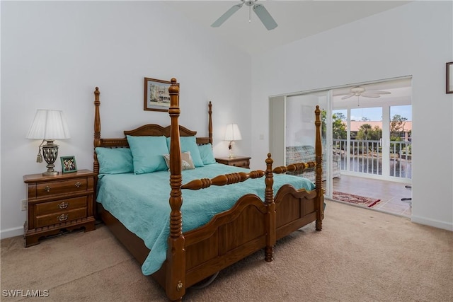 bedroom featuring ceiling fan, light colored carpet, and access to exterior