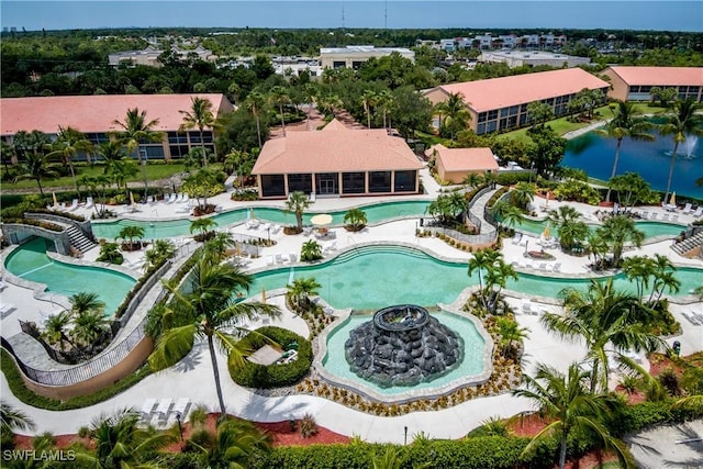 view of swimming pool with a water view