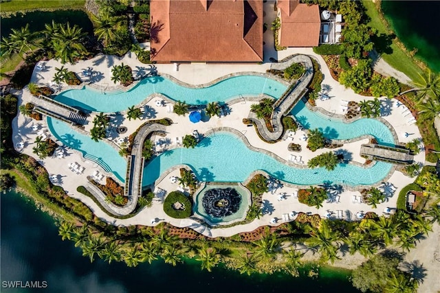 birds eye view of property featuring a water view