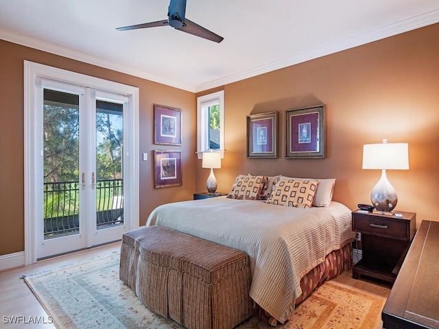 bedroom featuring ceiling fan, ornamental molding, access to exterior, and light hardwood / wood-style flooring