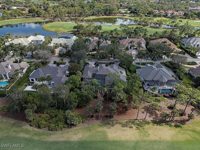 bird's eye view with a water view