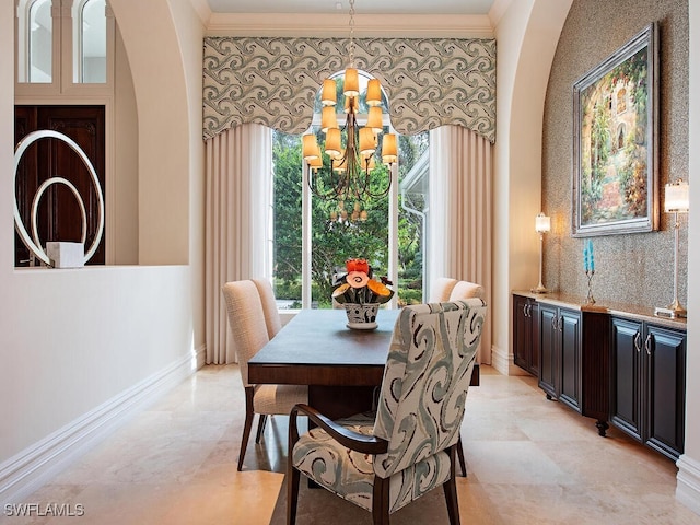 dining area featuring baseboards, a notable chandelier, crown molding, and wallpapered walls