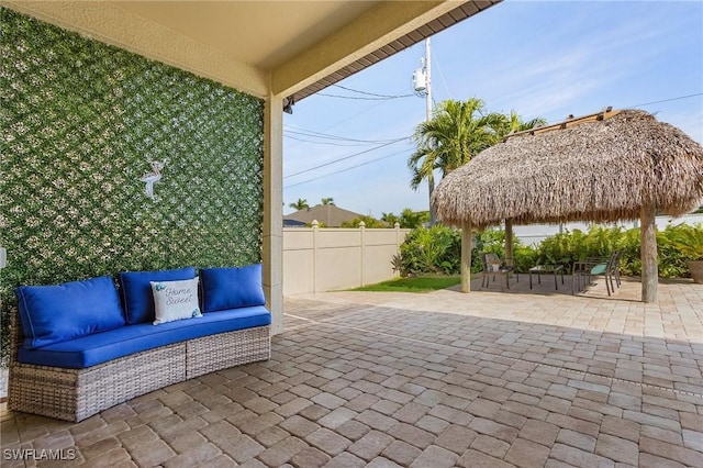 view of patio / terrace with a gazebo and an outdoor hangout area