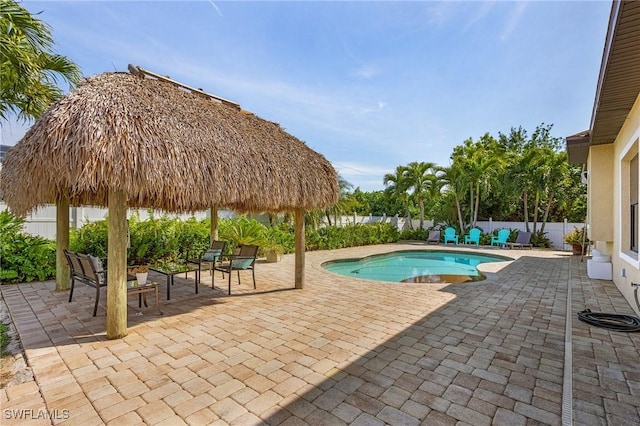 view of pool with a gazebo and a patio