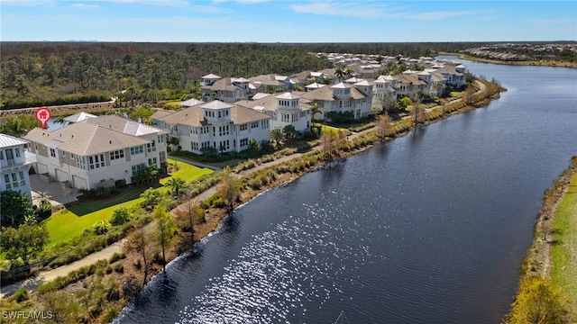 drone / aerial view featuring a water view