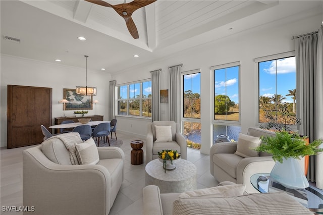 living room with visible vents, recessed lighting, crown molding, and baseboards