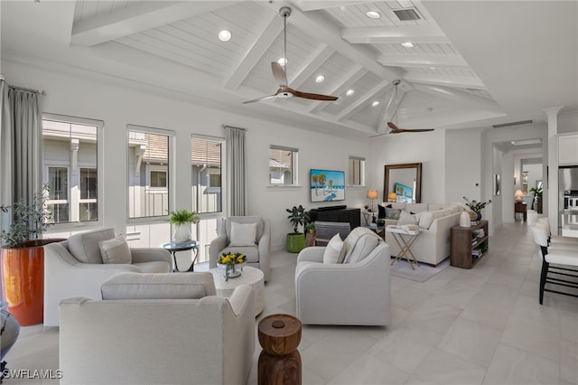 living room with visible vents, beam ceiling, high vaulted ceiling, and ceiling fan