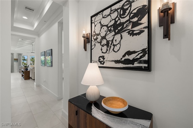 corridor with light tile patterned flooring, visible vents, recessed lighting, and baseboards