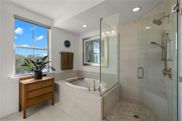 full bath with a bath, recessed lighting, and a stall shower