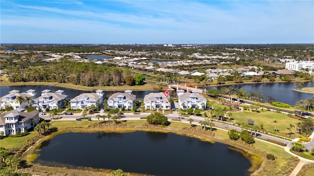 aerial view with a residential view and a water view