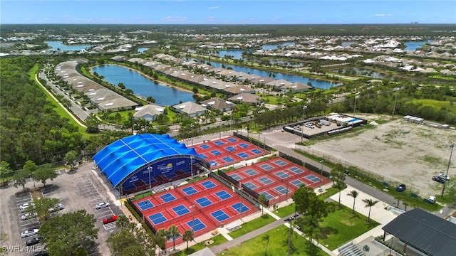 birds eye view of property featuring a residential view and a water view