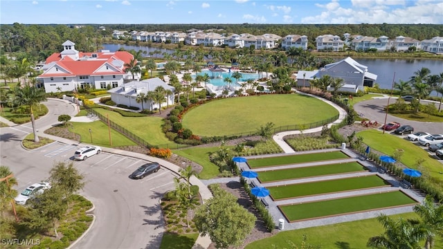 aerial view featuring a residential view and a water view