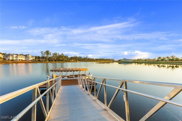 view of dock with a water view