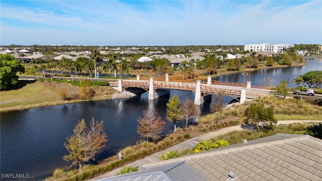 bird's eye view featuring a residential view and a water view