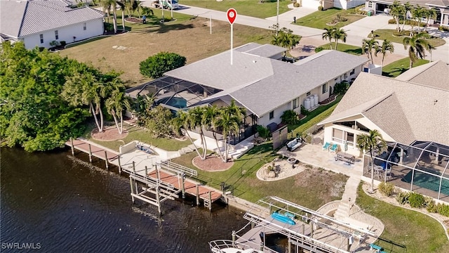 bird's eye view with a water view