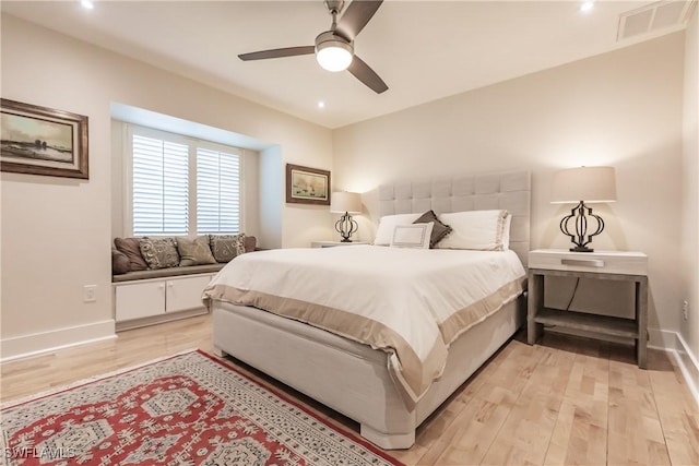 bedroom featuring ceiling fan and light hardwood / wood-style floors