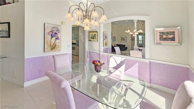 dining area with a notable chandelier