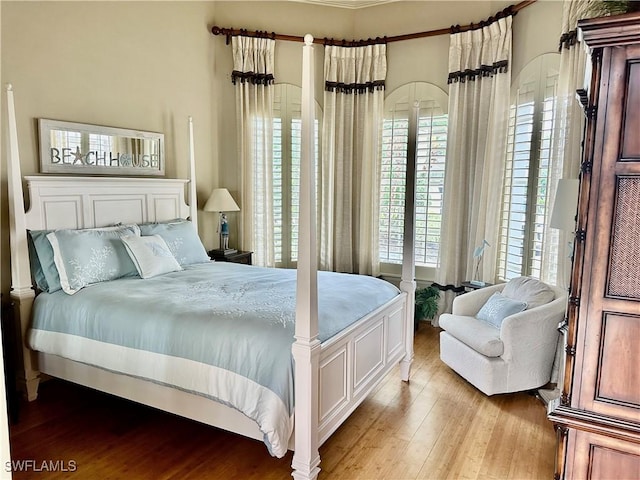 9411 Monteverdi Way, Fort Myers, FL 33912 - bedroom with light wood finished floors