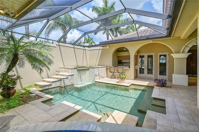 9411 Monteverdi Way, Fort Myers, FL 33912 - outdoor pool featuring french doors, a patio, and a lanai