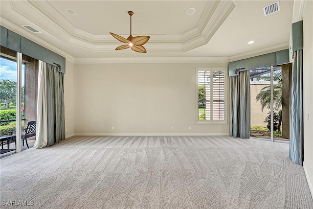 9411 Monteverdi Way, Fort Myers, FL 33912 - empty room featuring crown molding, ceiling fan, carpet floors, a raised ceiling, and baseboards