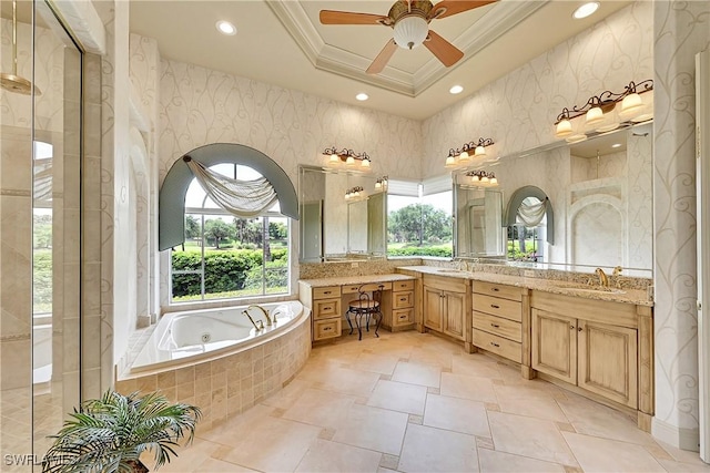 9411 Monteverdi Way, Fort Myers, FL 33912 - bathroom with a raised ceiling, a tub with jets, ceiling fan, double vanity, and ornamental molding