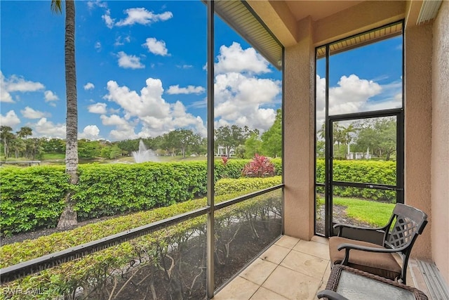 9411 Monteverdi Way, Fort Myers, FL 33912 - sunroom with view of scattered trees